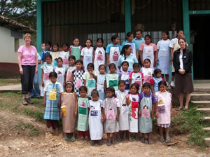 Honduran school children in pillowcase dresses donated by Angels of Mercy in Rochester, NY