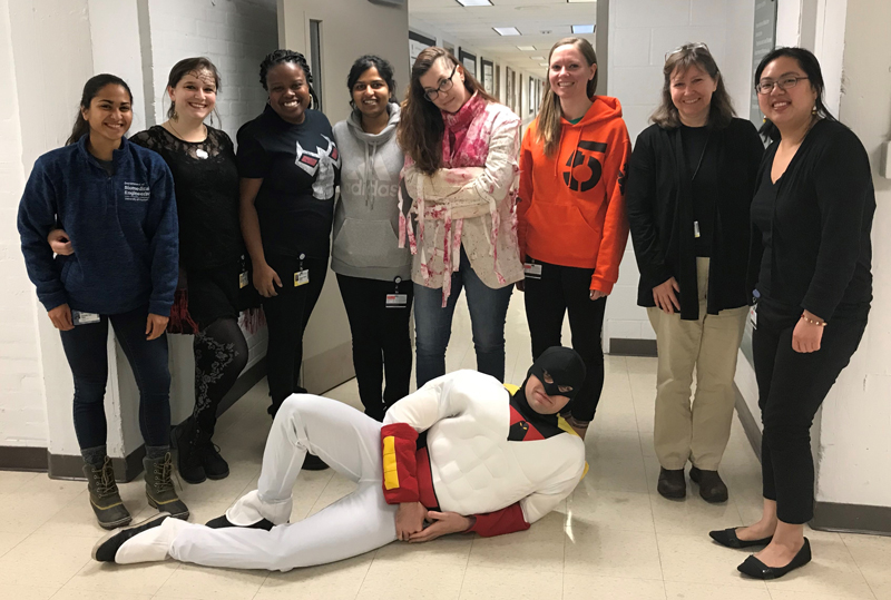 Group photo of Majewska lab personnel in halloween costumes