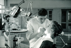Dr. Bill Sims, UK, with a patient.