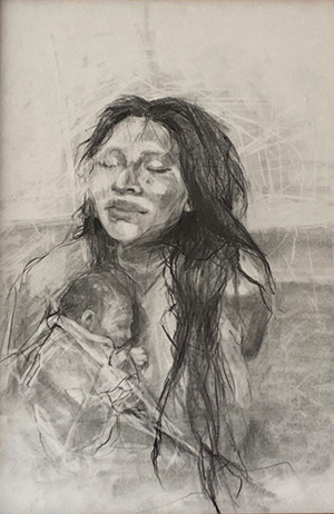 Indigenous woman snuggling a baby