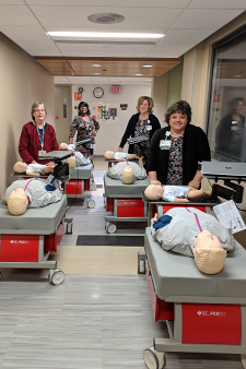Nurse educators wheel the new mobile training units to their first training sessions.