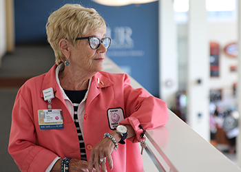 Rose looks out over the Strong Memorial Hospital Main Lobby Atrium during our interview.