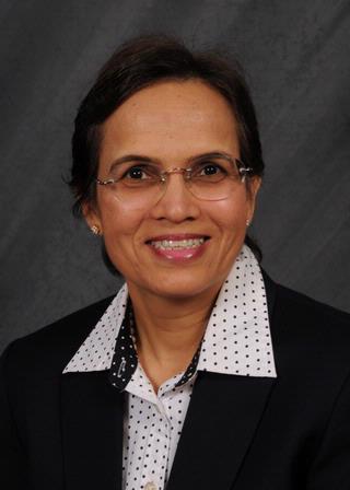Nirmala Tasgaonkar, D.D.S.