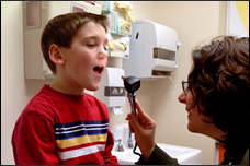 Boy  getting check up