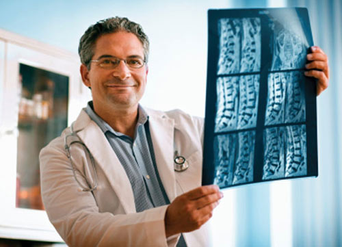 Doctor reading CT scan