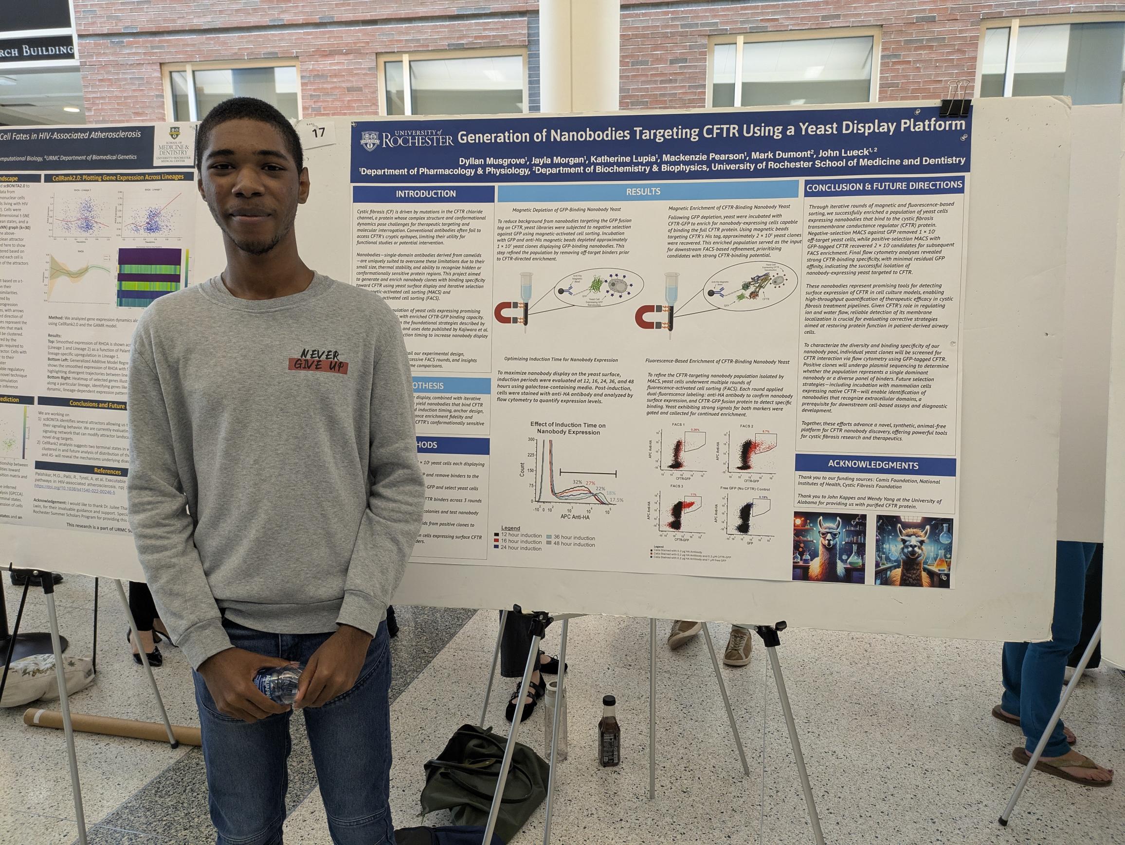 student presents scientific poster
