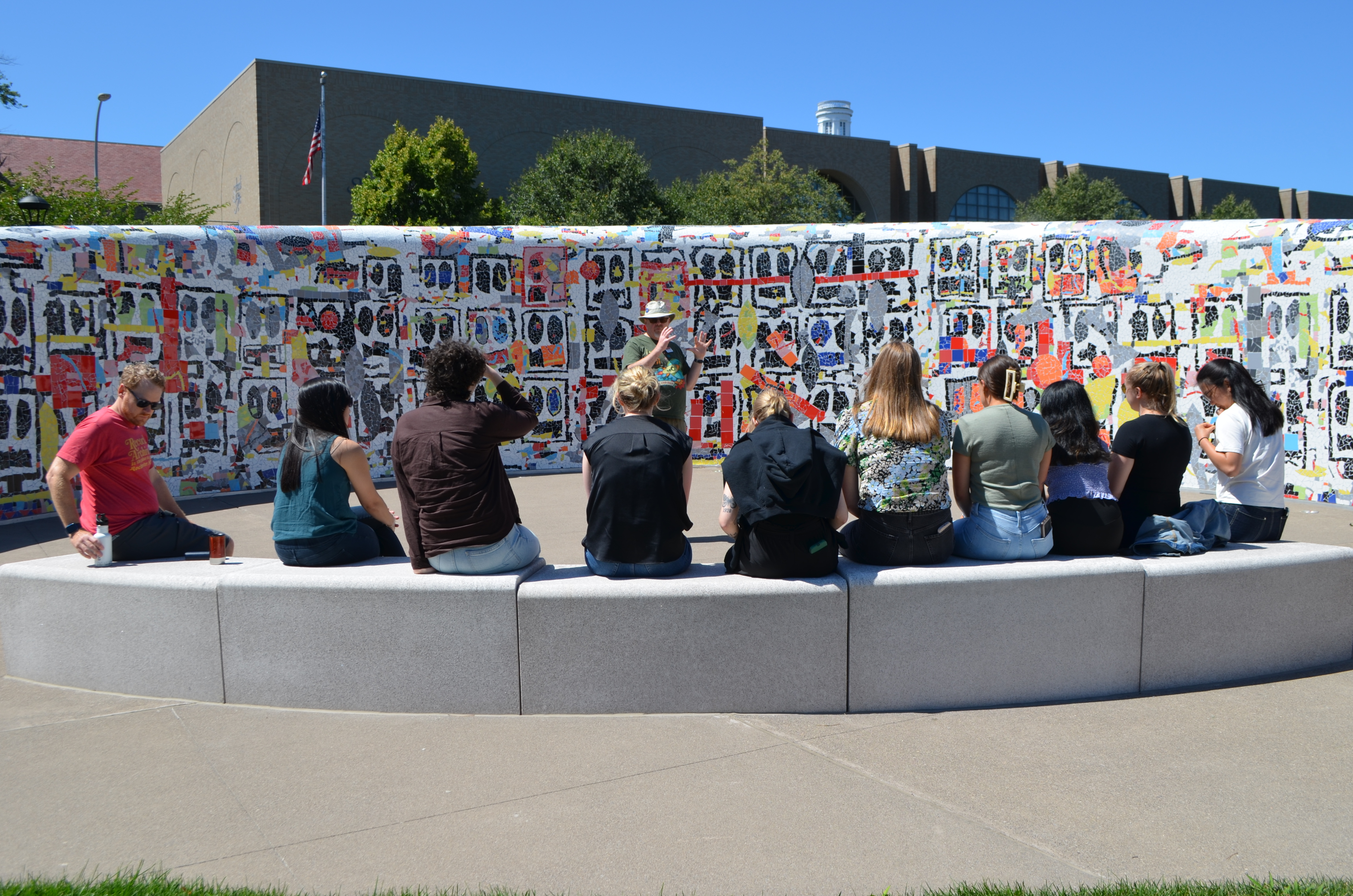 Residents learning together at a wall