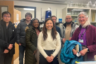 Trainees and PI visiting research lab