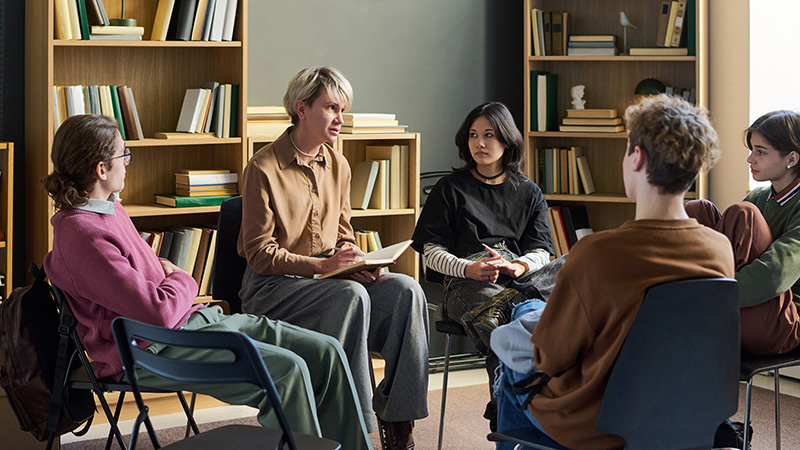 Group of teens in group therapy