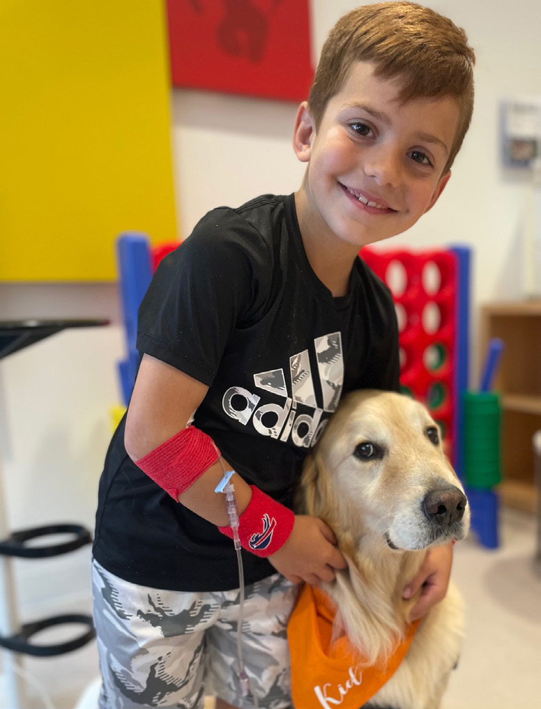 Boy with dog in hospital