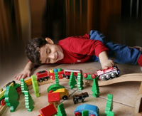 Boy Playing With Trains