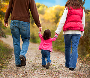 Family walking on a country path