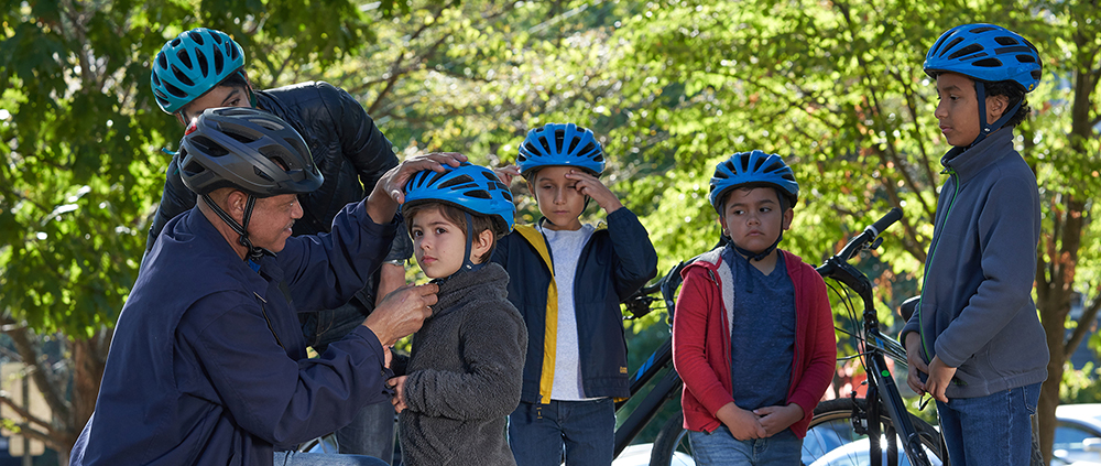 kids biking with helmets