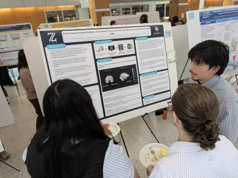 studend with scientific poster