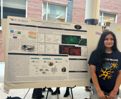 student presents scientific poster