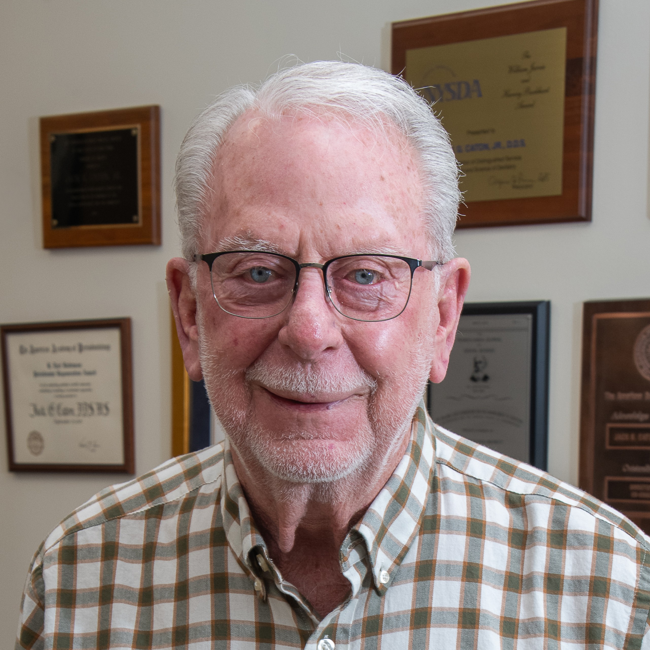 A portrait of Dr. Jack Caton.