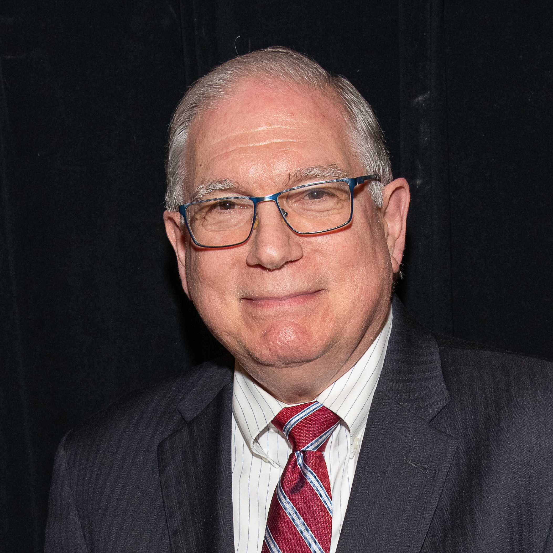 A portrait of Dr. Lawrence Tabak.