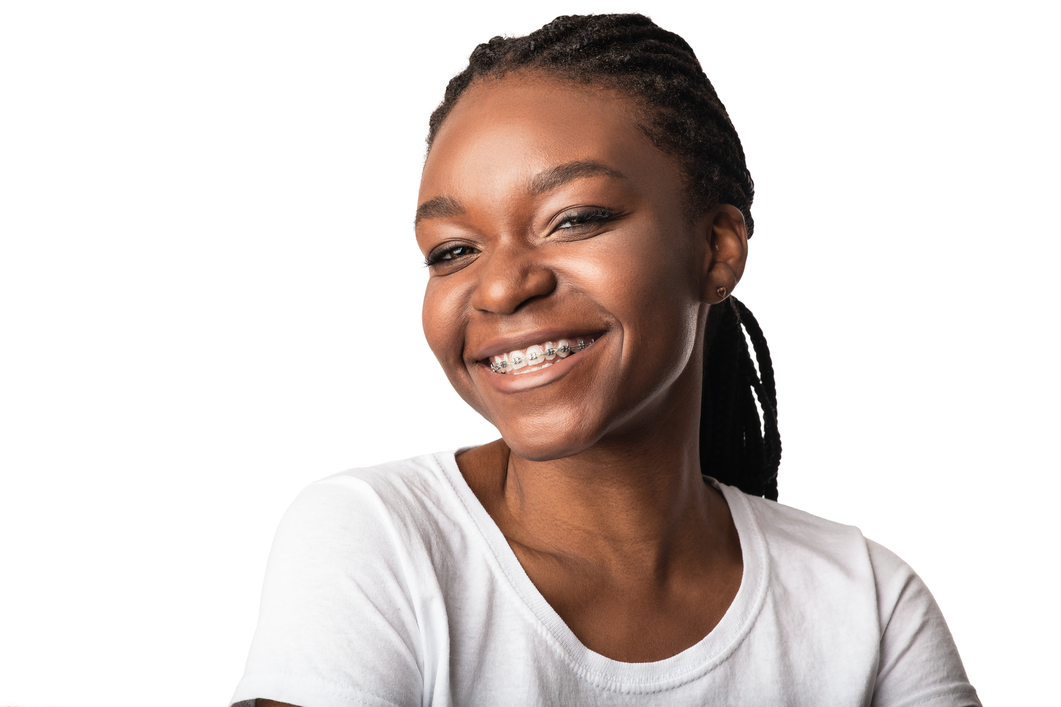 teen girl with braces smiling at camera