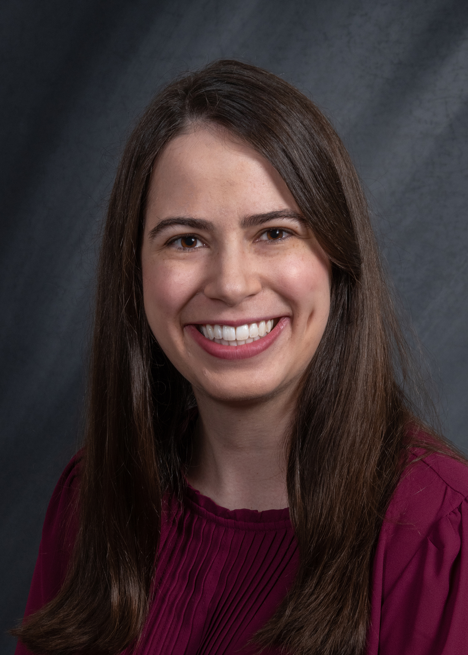 A portrait of Dr. Erinn Enany.