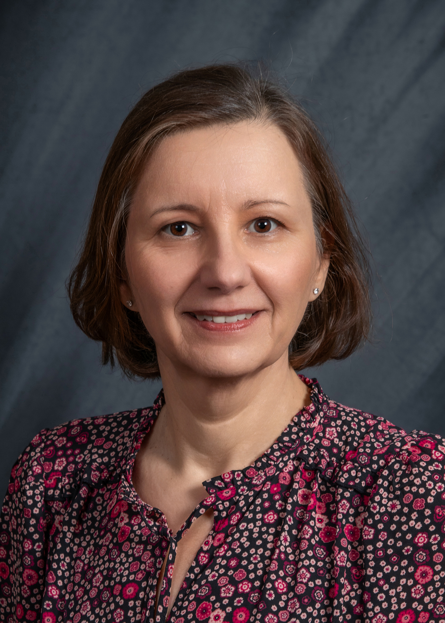 A portrait of Dr. Dorota Kopycka-Kedzierawski