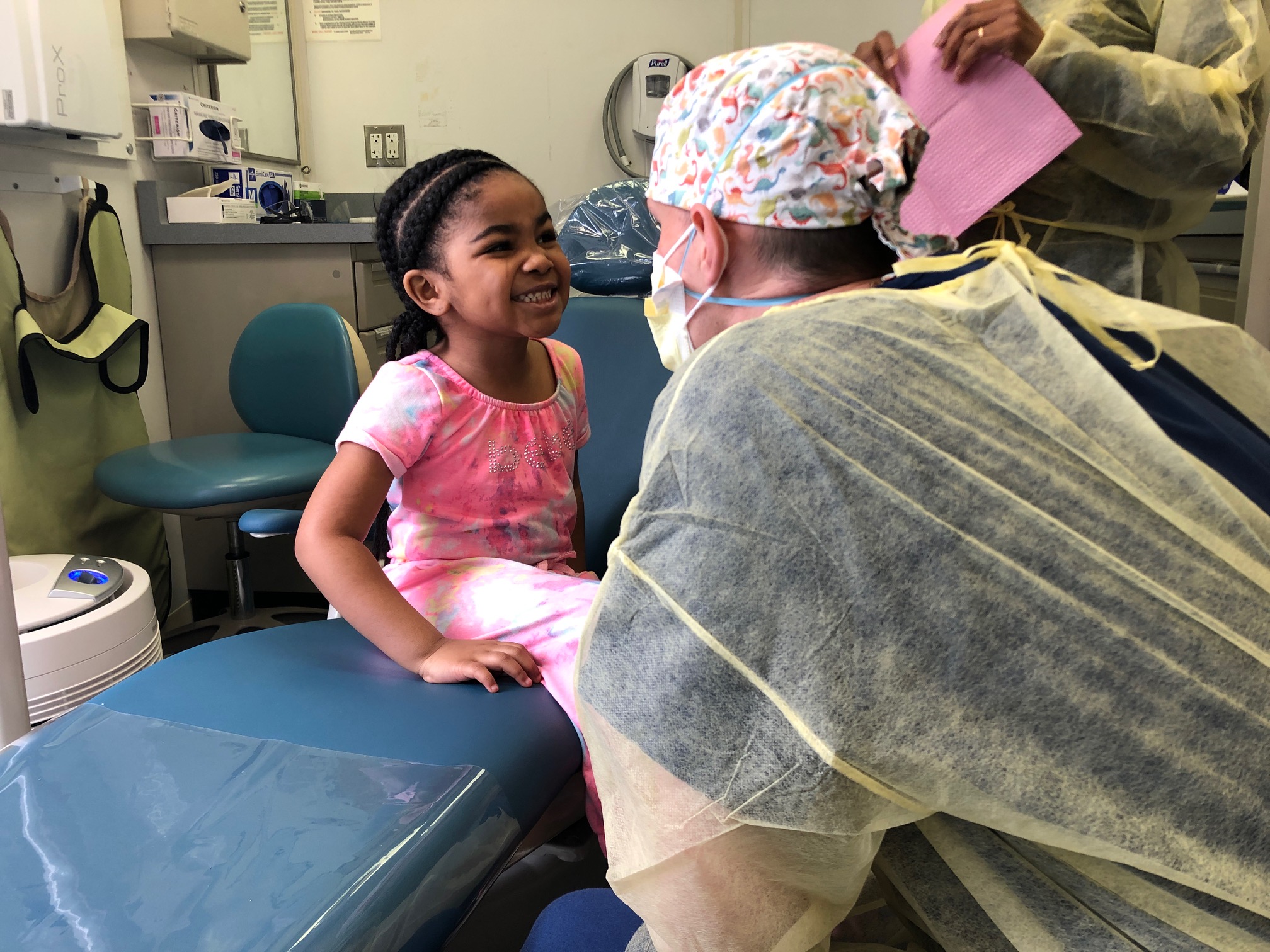 young patient smiling for dentist