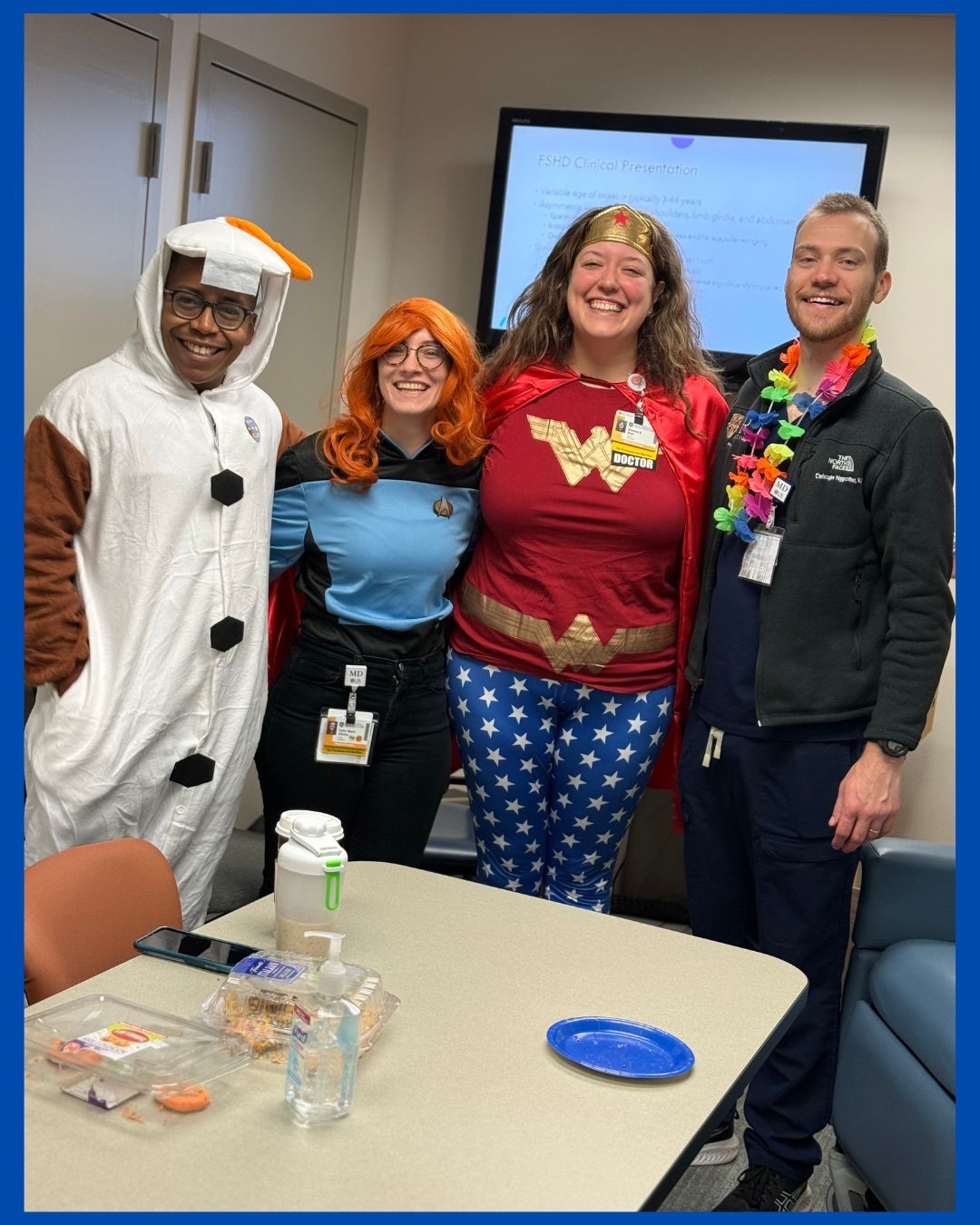 Team members gathered during a fall office celebration.
