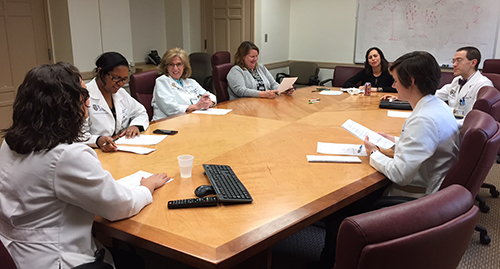 Aspen, Natalia Miles, Barb Olesko, Maureen Graham, Jenn Richman, Mark Oldham, Annalyn Gibson in PCLS conference room