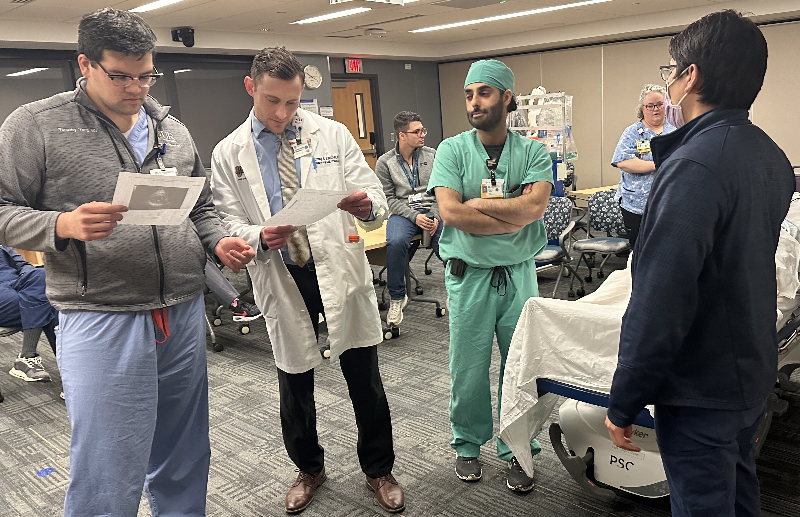 Fellows rounding under the supervision of Department of Medicine Chair, Paul Levy, MD