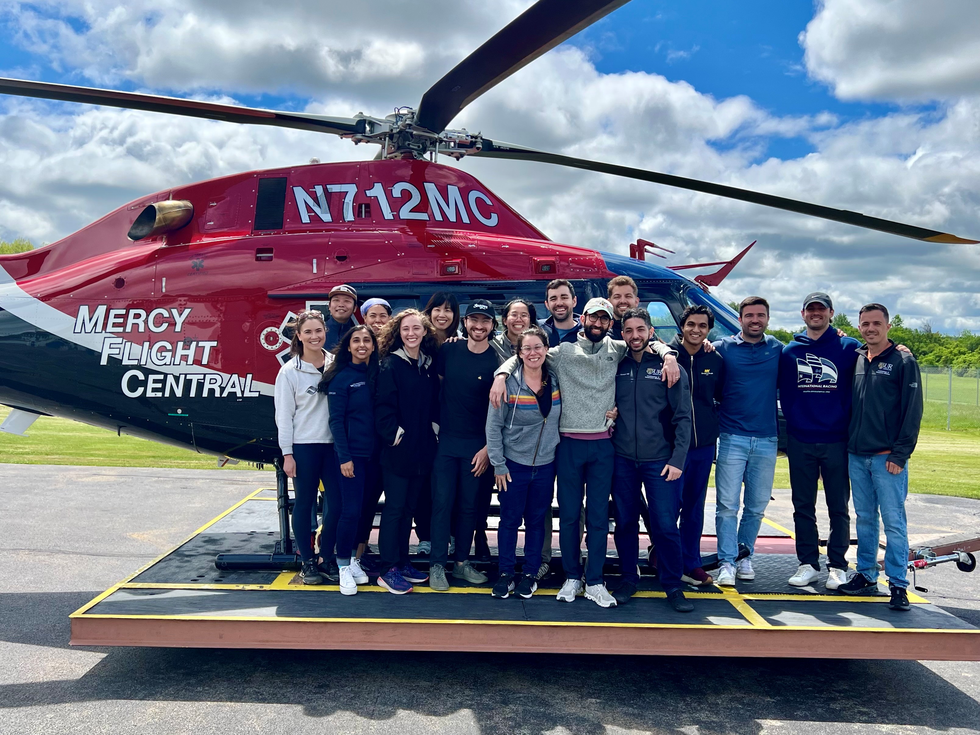2026 in front of helicopter