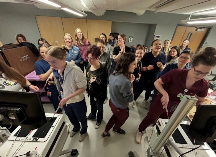 Residents practicing laparoscopic skills