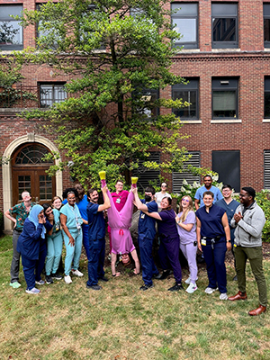Residents Having Fun Outside, One of them Doing a Handstand