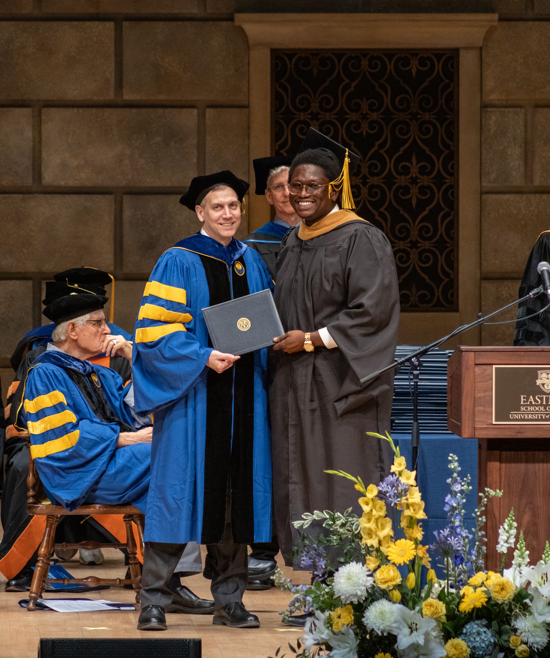 Emmanuel receiving his MBA