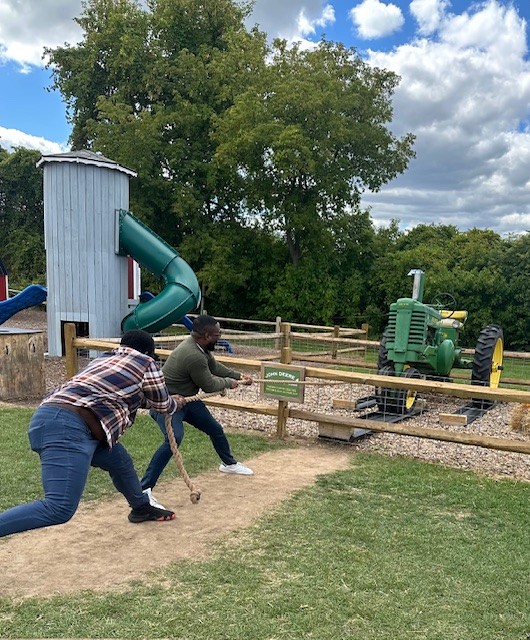 Residents participating in a tractor pull