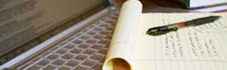 writing services header photo of paper and pen