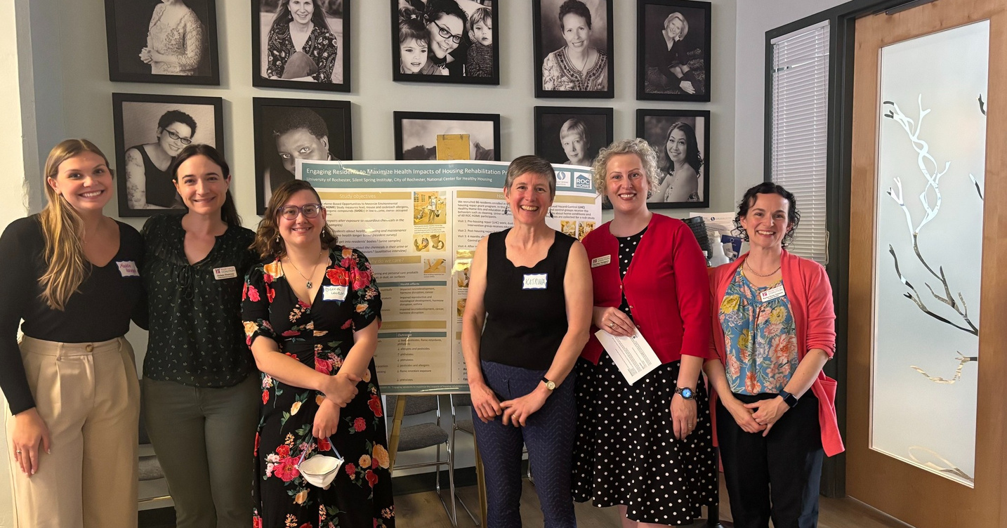 EHSC Faculty in front of poster
