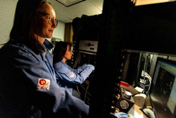 Elizabeth Plunk (left) and Alexis Feidler (right) use a
confocal microscope in the Majewska Lab
