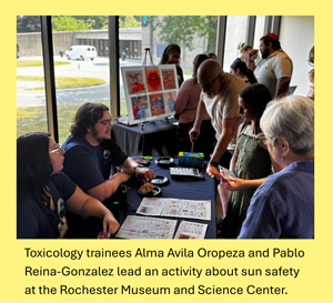 Toxicology trainees lead an activity about sun safety