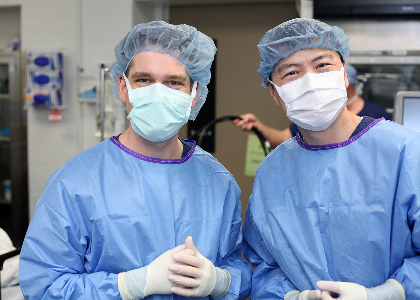 Jay in surgical gown and mask in OR with MB