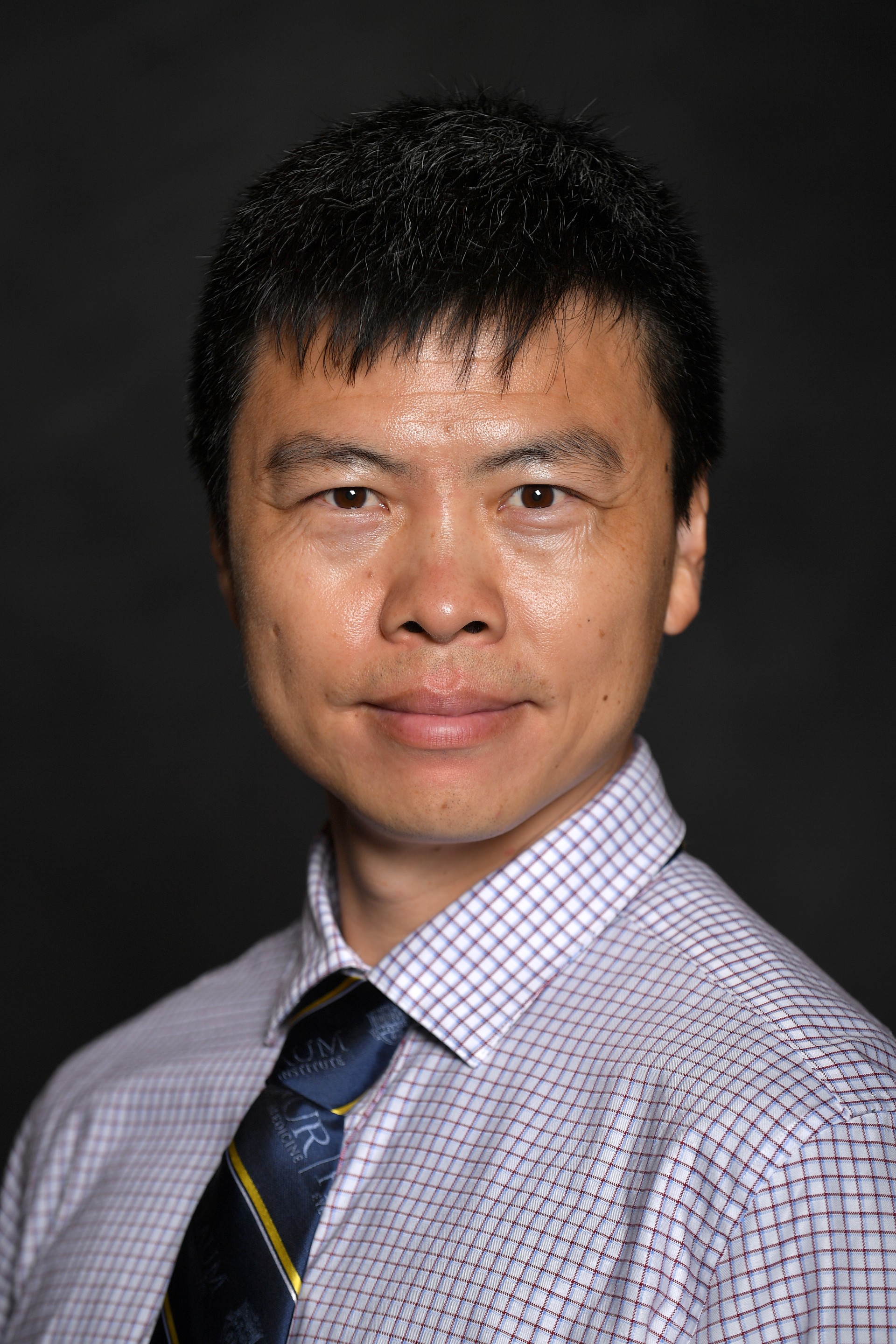 Qingjie “Jay” Wang Headshot