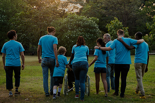 group of people walking in park