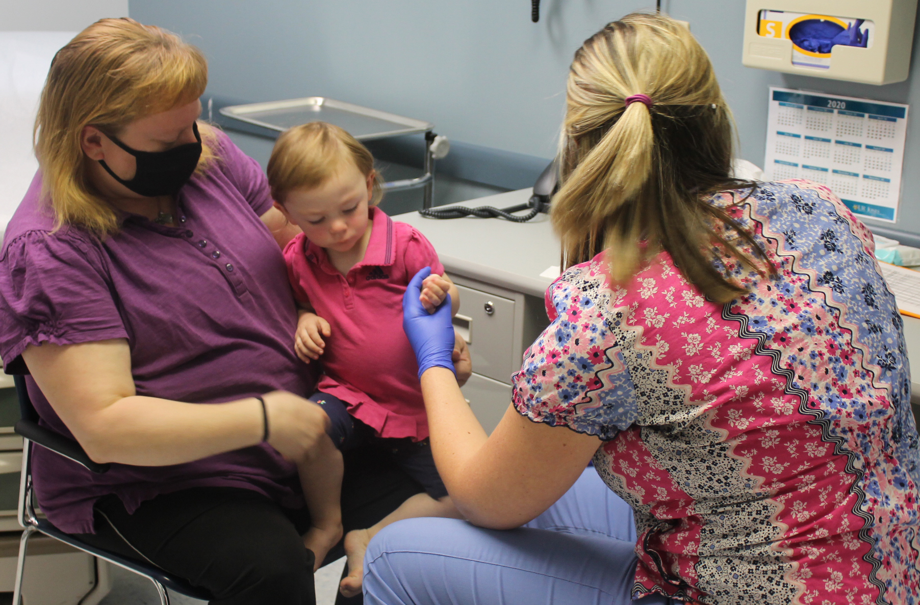 Nurse Sara Abbott testing pediatric patient