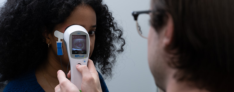Woman looking into eye scan