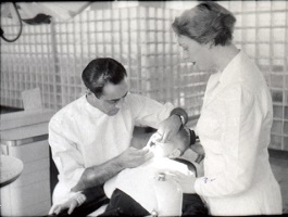 Dr. Nawab and Assistant Examine Patient's Mouth