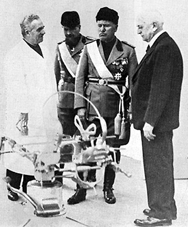 Benito Mussolini and Dr. Harvey Burkhart inspecting dental equipment at the dedication