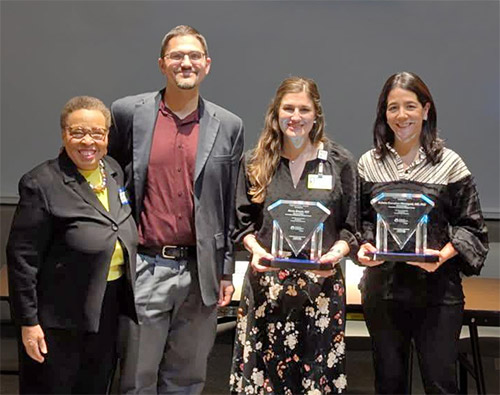 Marilyn Sibley (left) presents awards to Drs. Benjamin Korman, Karen Kruzer and Roberta Goncalves Marangoni at the National Scleroderma Foundation Rochester Education Forum held at URMC, November 2025