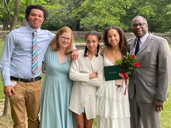 Jeffrey Alexis (far right) and family