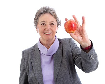 Photo of woman holding apple