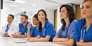 Trainees listening to a talk