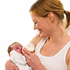Center for Modern Infant Feeding - mother feeding baby a bottle