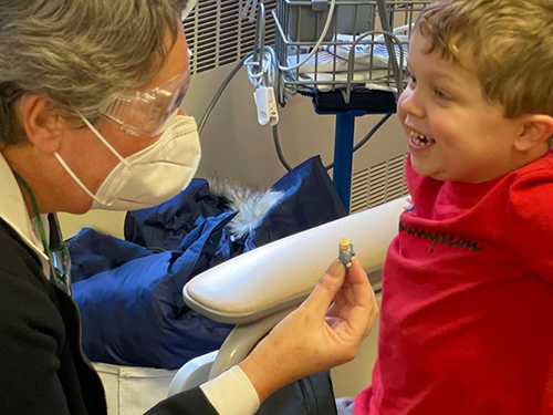 Child laughing with Doctor